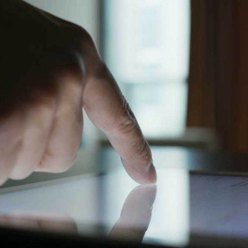 Woman use of tablet computer at home